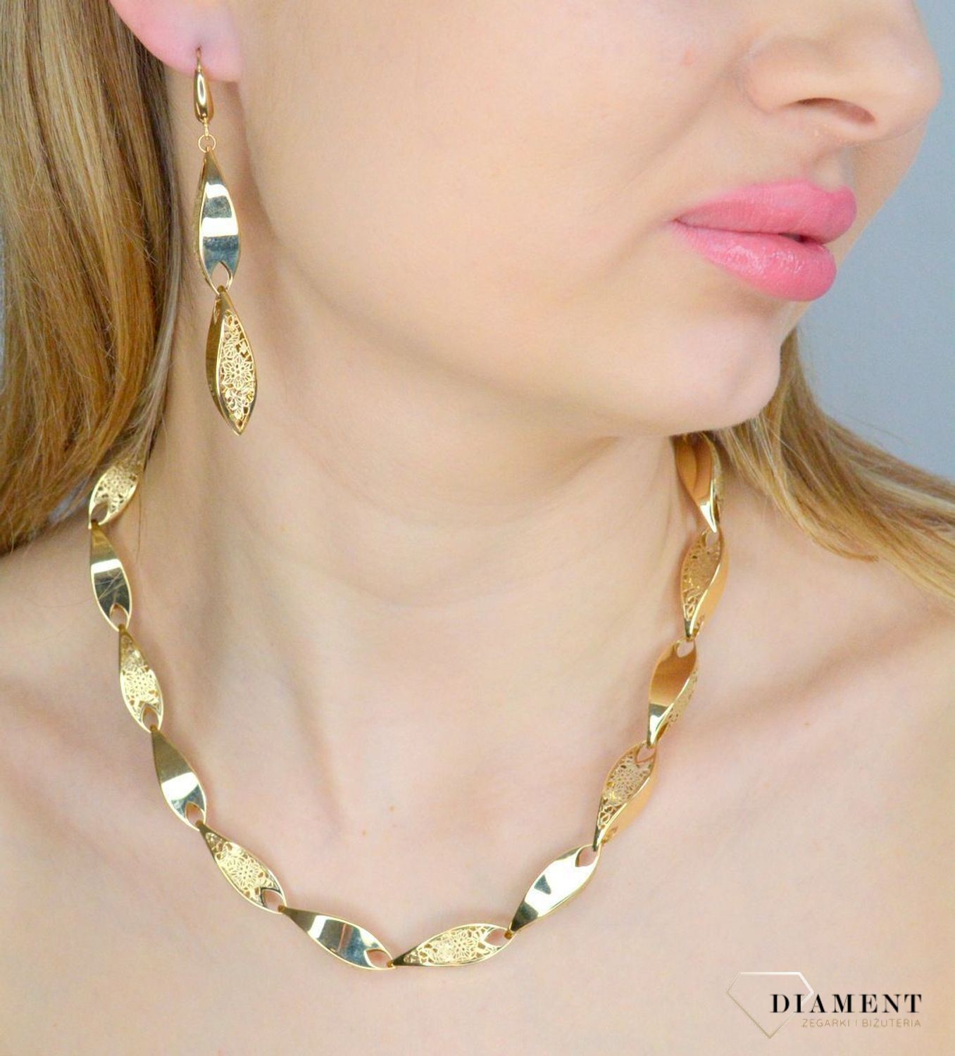 Złote kolczyki damskie 585 wiszące ażurowe DIA-KLC-11278-585. Złote kolczyki damskie. Złote kolczyki wiszące. Kolczyki złote wiszące. Kolczyki złote na bigiel. Kolczyki złote wiszące na prezent..jpg