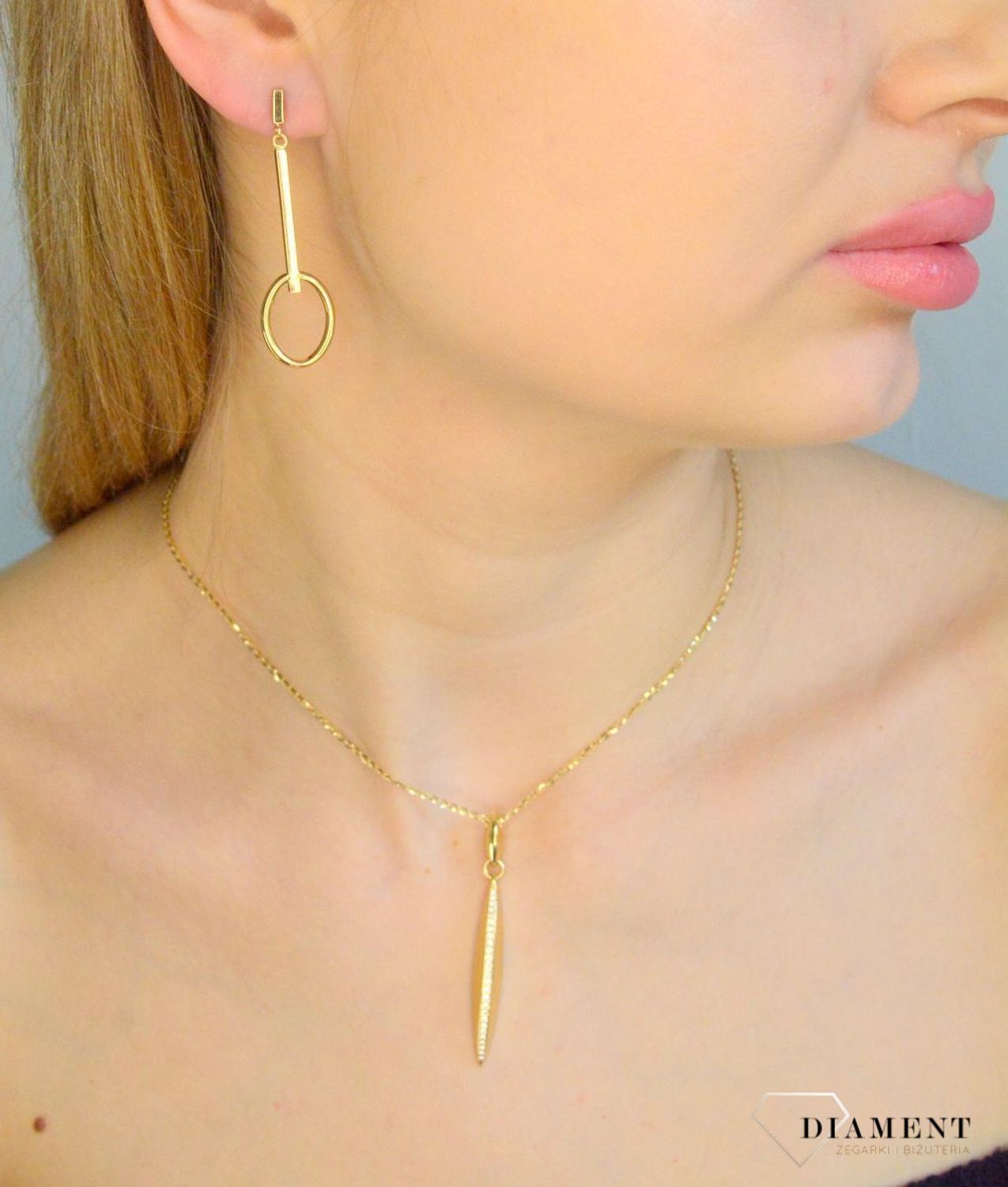 Złote kolczyki damskie 585 wiszące patyczki z owalnym zakończeniem DIA-KLC-11295-585. Złote kolczyki damskie. Złote kolczyki wiszące. Kolczyki złote wiszące. Kolczyki złote na sztyft. Kolczyki złote wiszące na prezent..jpg