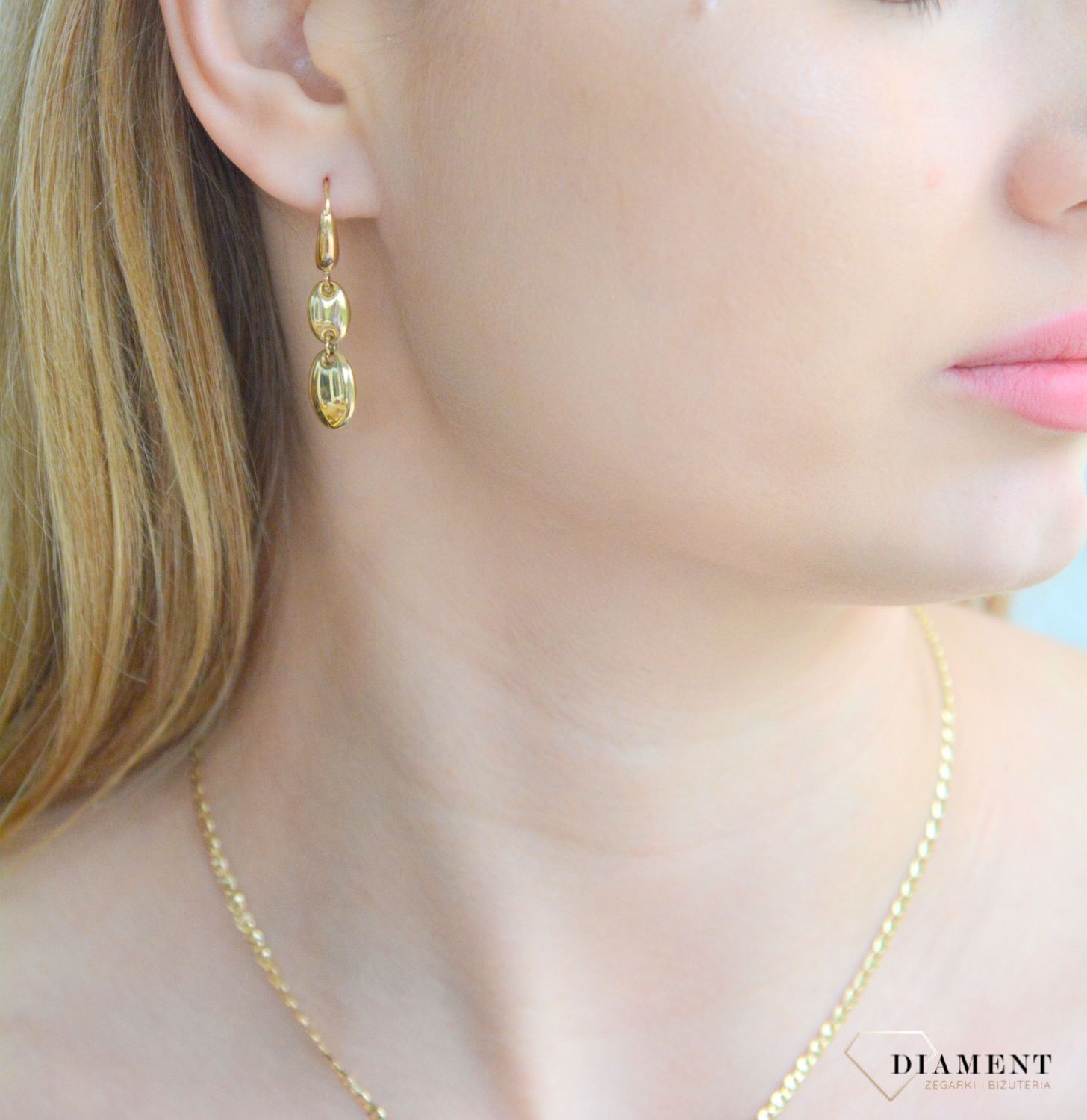 Złote kolczyki damskie 585 wiszące owalne blaszki DIA-KLC-11297-585. Złote kolczyki damskie. Złote kolczyki wiszące. Kolczyki złote wiszące. Kolczyki złote na bigiel. Kolczyki złote wiszące na prezent..jpg