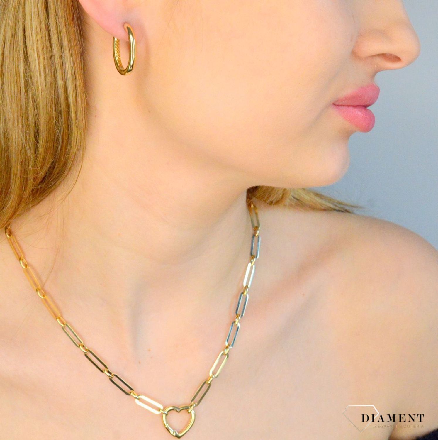 Kolczyki damskie złote 585 owalne gładkie kółka DIA-KLC-11313-585. Złote kolczyki damskie. Złote kolczyki owalne. Kolczyki złote owalne koła. Kolczyki złote damskie na prezent..jpg