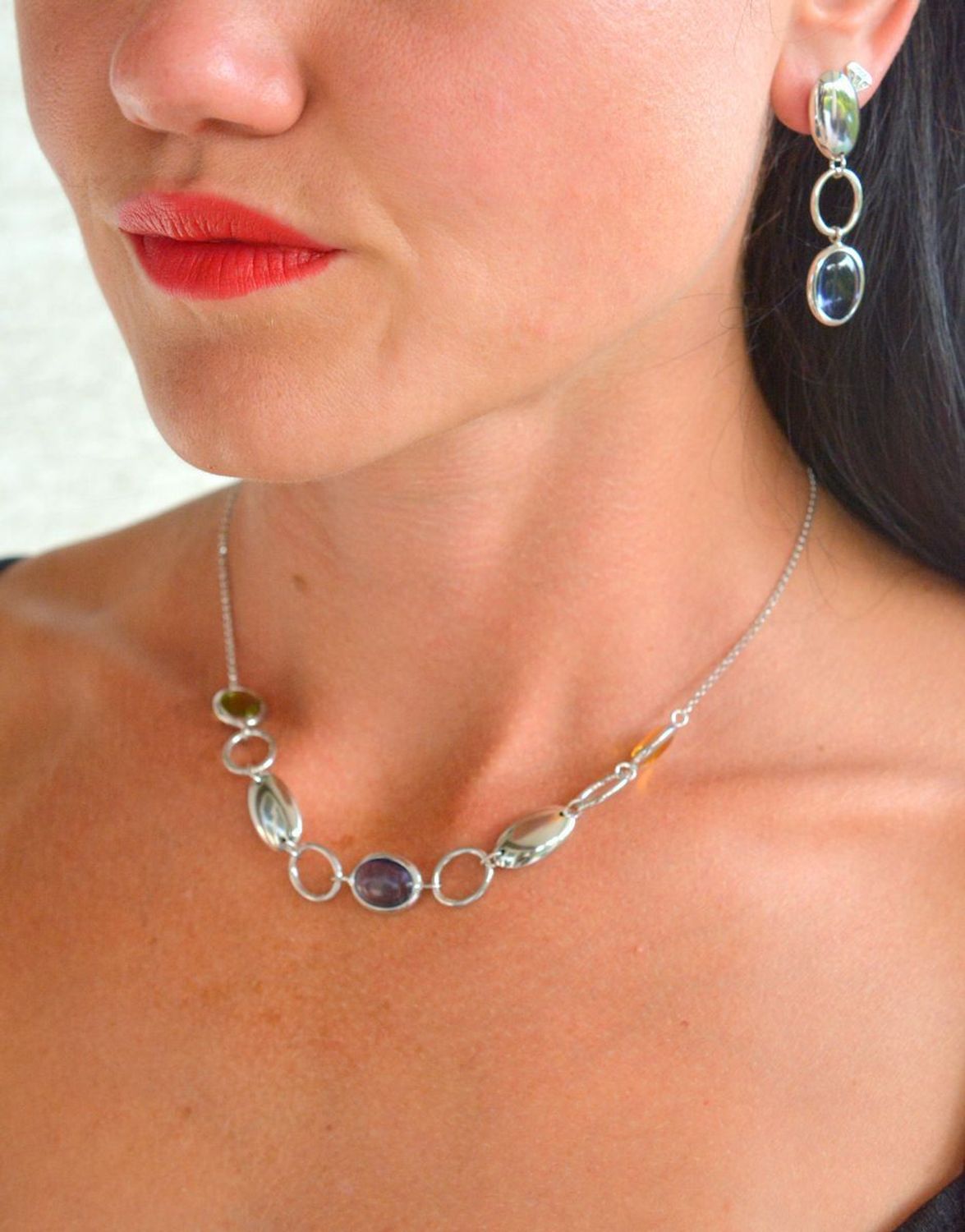 Srebrne kolczyki damskie wiszące owale z fioletową cyrkonią DIA-KLC-11699-925.jpg