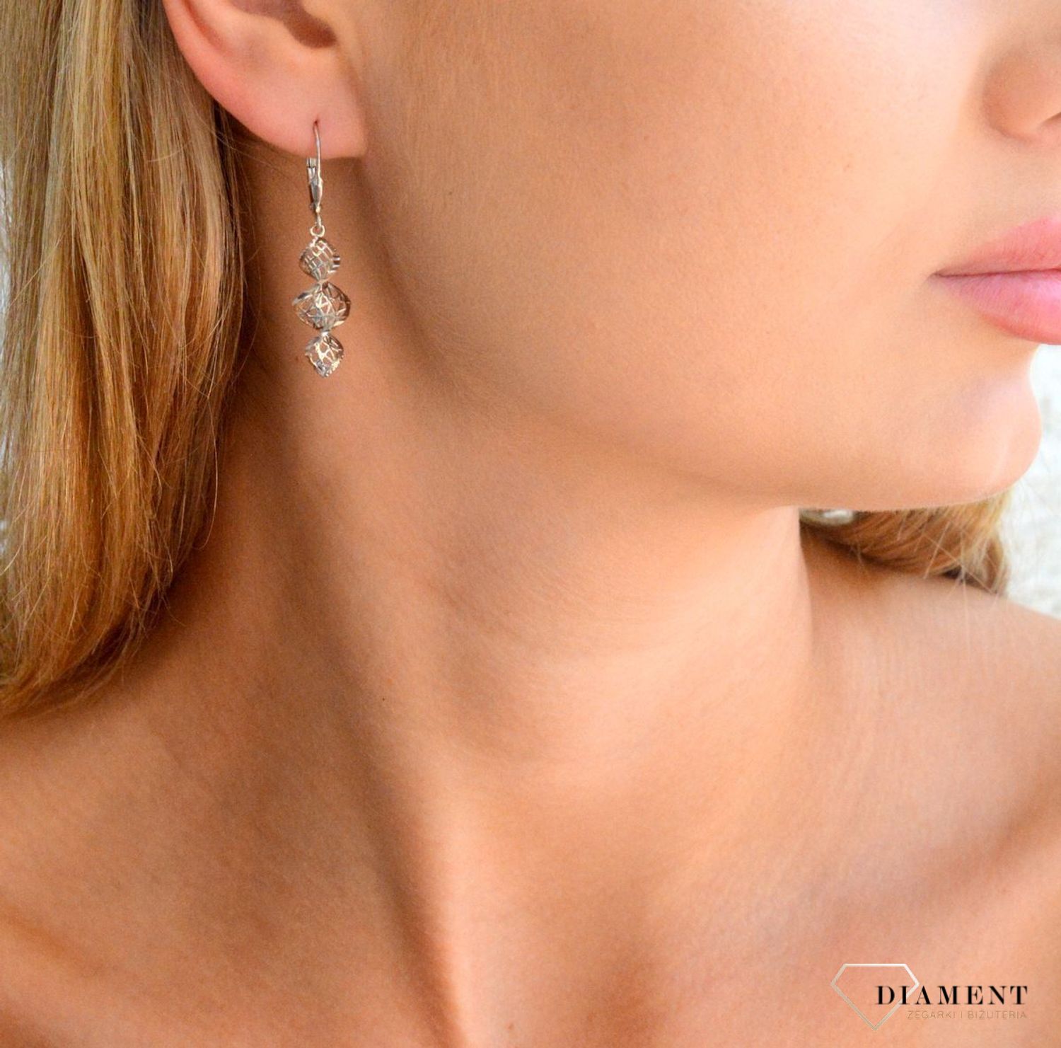 Srebrne kolczyki damskie 925 zakręcone ażurowe na bigiel DIA-KLC-11816-925.jpg