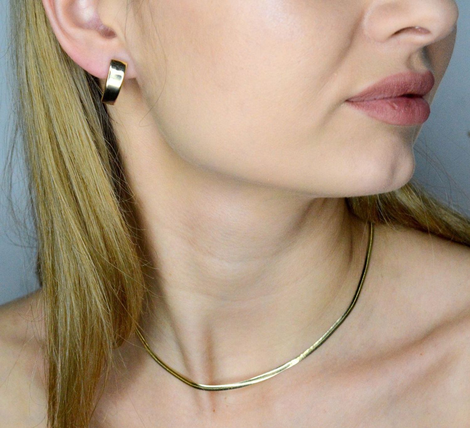 Kolczyki złote zapięcie ang. próba 585, DIA-KLC-12087-585  Złote kolczyki zostały wykonane z najwyższej jakości złota próby 585. Złote kolczyki o prostym kształcie z gładką powierzchnią. Kunsztownie.jpg