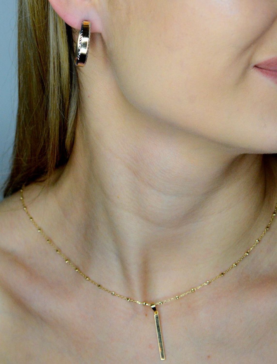 Złote kolczyki damskie 375 owalne z dodatkiem białego złota na brzegach  DIA-KLC-12597-375 (1).jpg