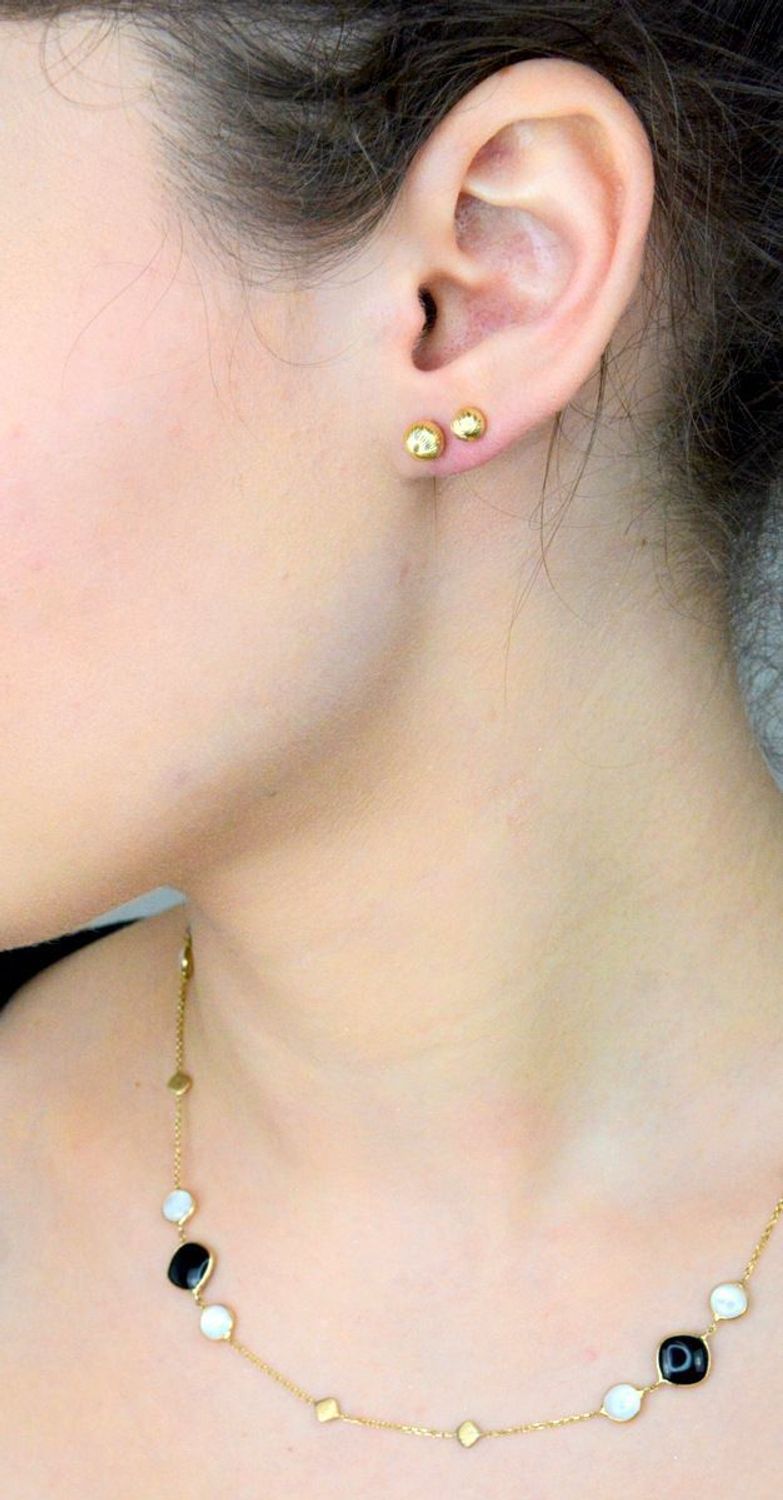 Kolczyki złote z ozdobnym grawerem kulki pr 585, DIA-KLC-12903-585 Stylowe kolczyki wykonane ze złota próby 585. Kolczyki mają okrągły kształt, ozdobione grawerem. 1.jpg