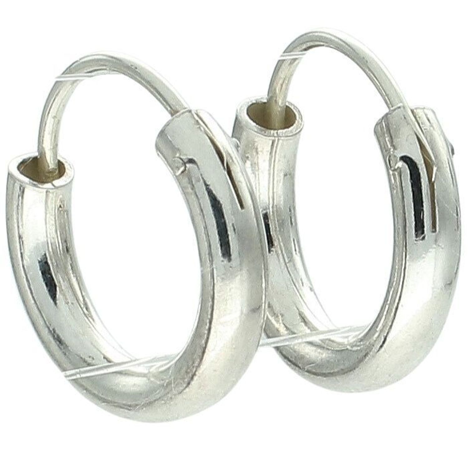 Eleganckie srebrne kolczyki damskie DIA-KLC-13230-925 w kształcie gładkich kółeczek. Długość 1,5 cm, zapięcie szarnir, lekkie i uniwersalne, idealne na co dzień i na prezent.1.jpg