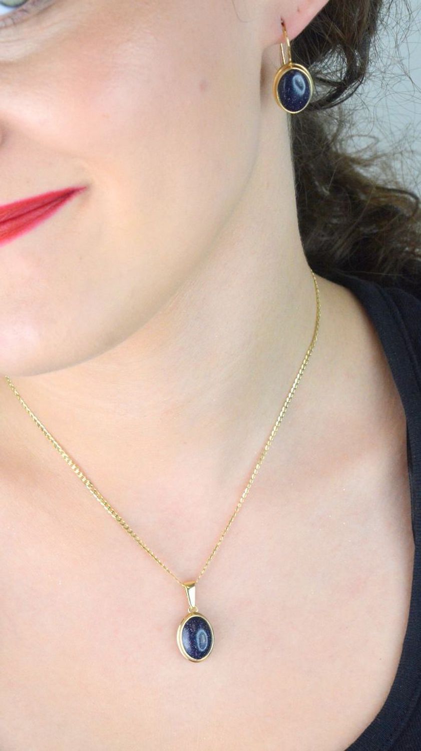 Złote kolczyki damskie próby 585, model owalny „Noc Kairu” DIA-KLC-13283-585 – 5,30g, długość 2,6 cm, zapięcie na bigiel. Elegancka i trwała biżuteria.1.jpg