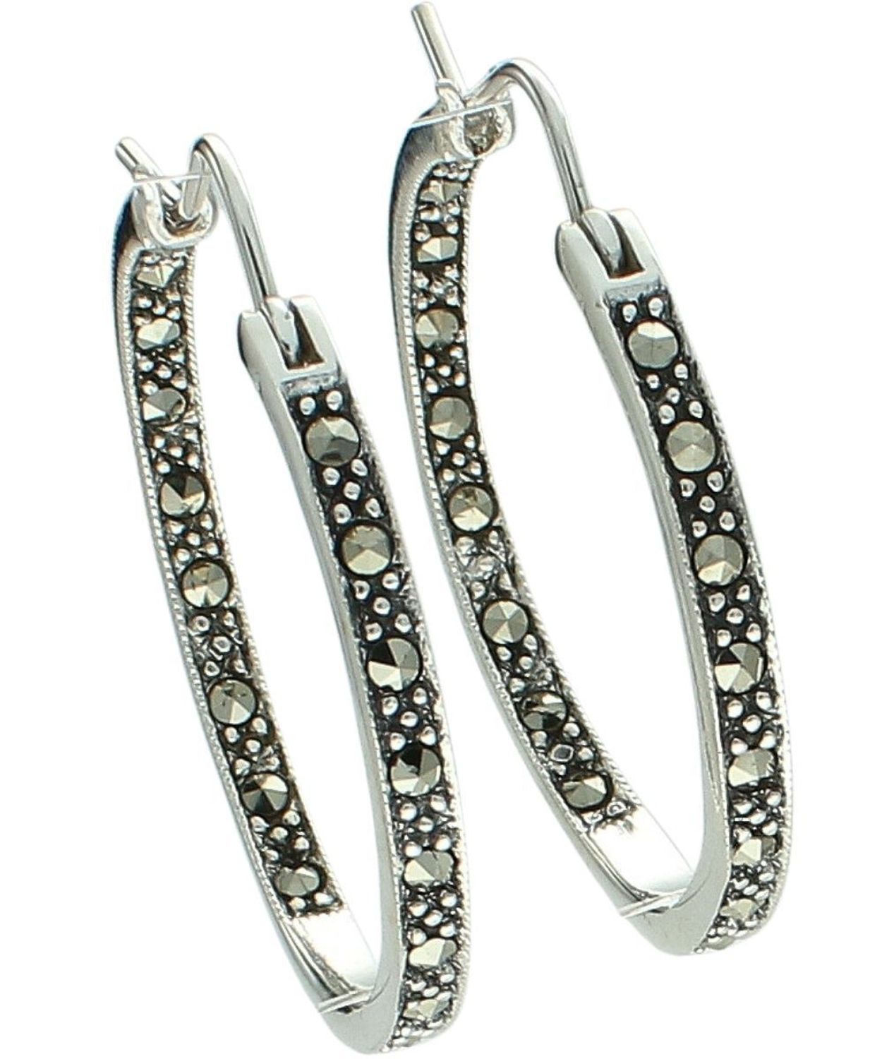 Kolczyki damskie ze srebra próby 925 DIA-KLC-14057-925 w formie kół, zdobione markazytami. Zapięcie kreol, długość 3,5 cm, szerokość 3 mm, waga 8,84 g. Elegancka biżuteria na co dzień i na prezent.1.jpg