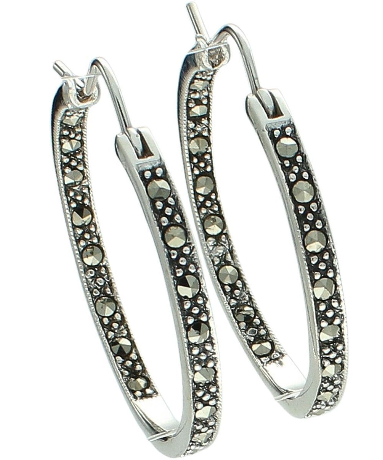 Kolczyki damskie ze srebra próby 925 DIA-KLC-14057-925 w formie kół, zdobione markazytami. Zapięcie kreol, długość 3,5 cm, szerokość 3 mm, waga 8,84 g. Elegancka biżuteria na co dzień i na prezent.1.jpg