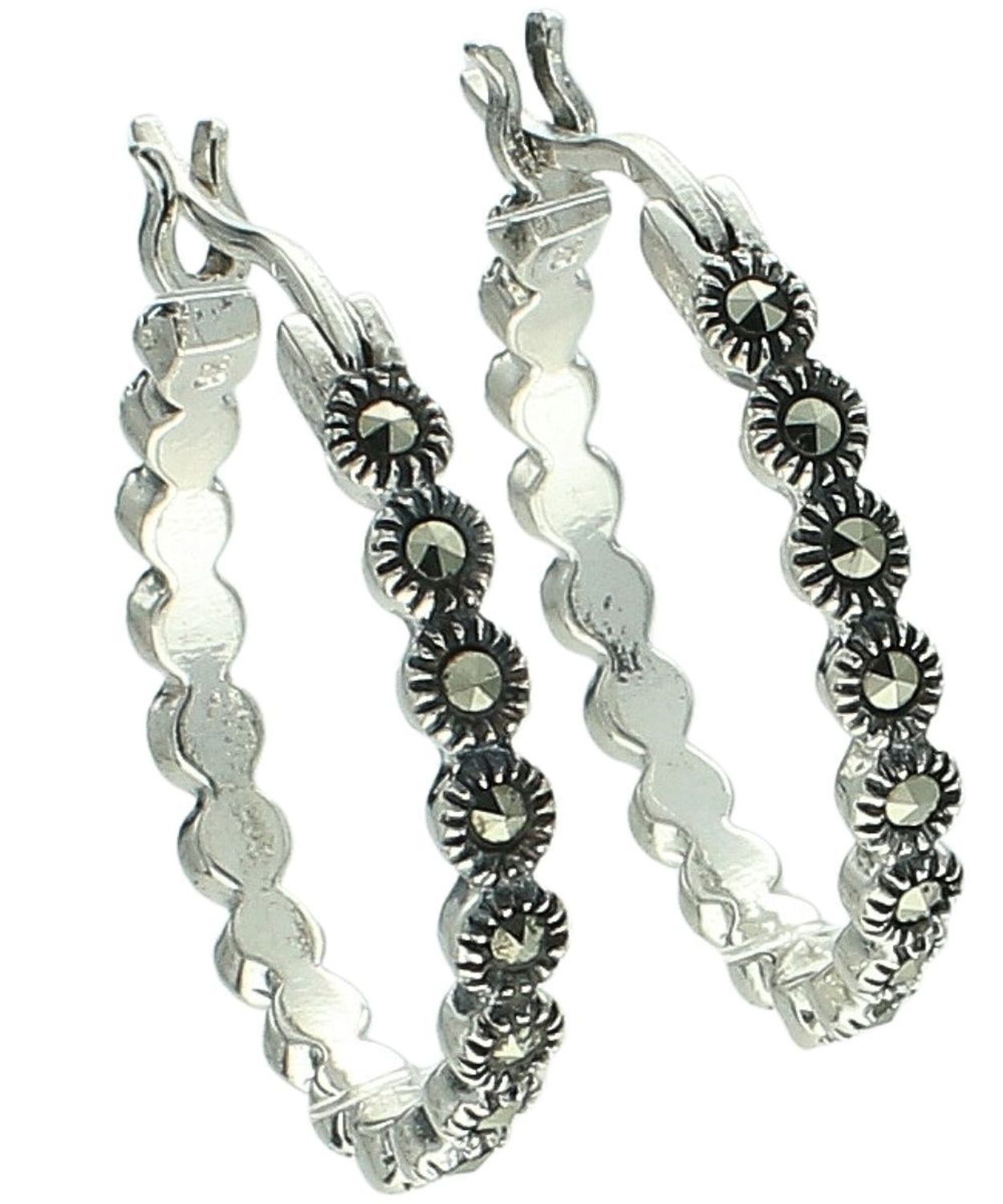 Kolczyki damskie ze srebra próby 925 w formie kół, zdobione markazytami. Zapięcie typu kreol, długość 2,2 cm, szerokość 2 mm, waga 4,55 g. Elegancka biżuteria na co dzień i na prezent.1.jpg