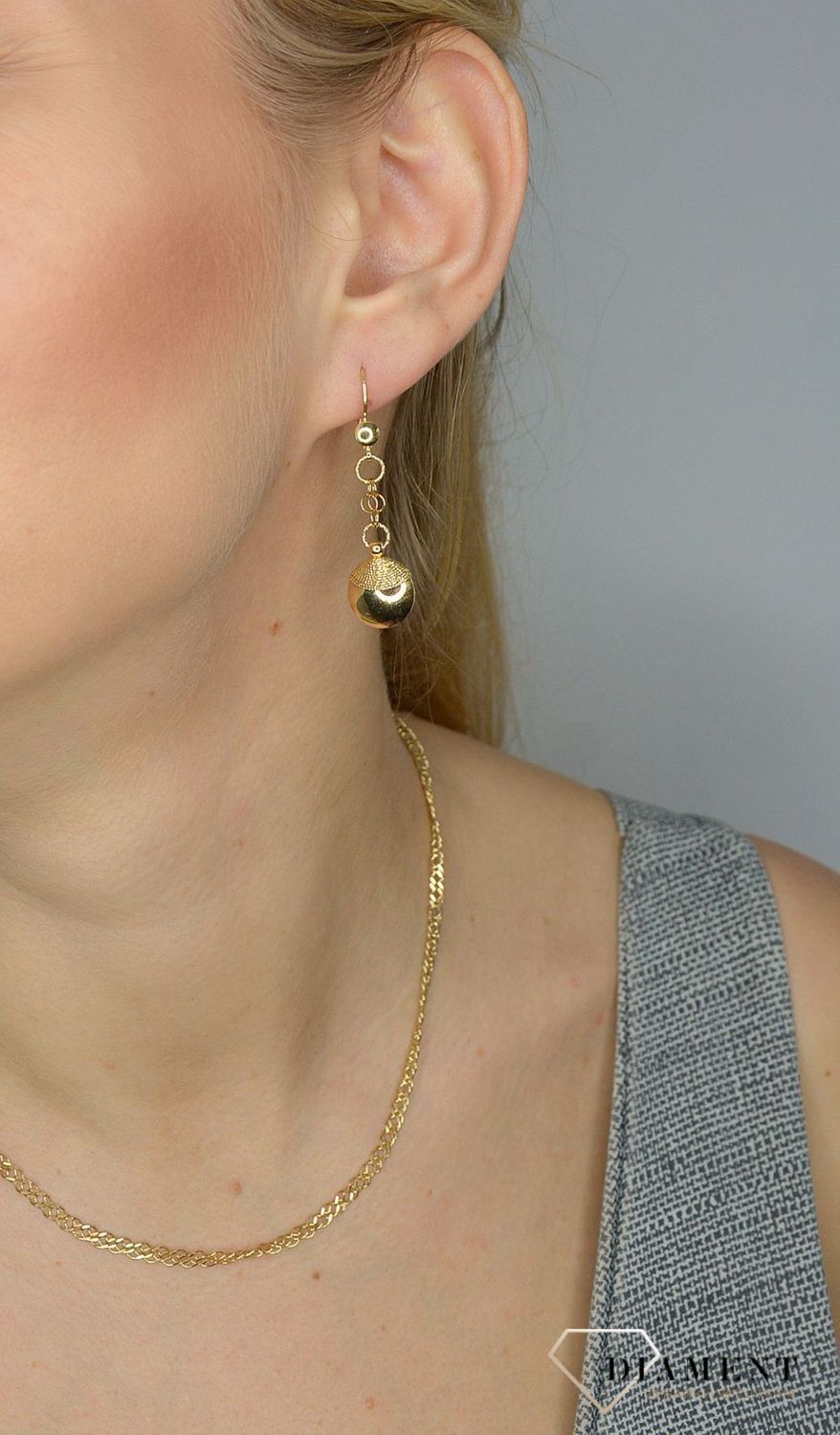 Złote kolczyki 585 wiszące DIA-KLC-1425-585 💎 Złote kolczyki w formie wiszącej łezki, jedna z nich została wykonana z białego złota.jpg