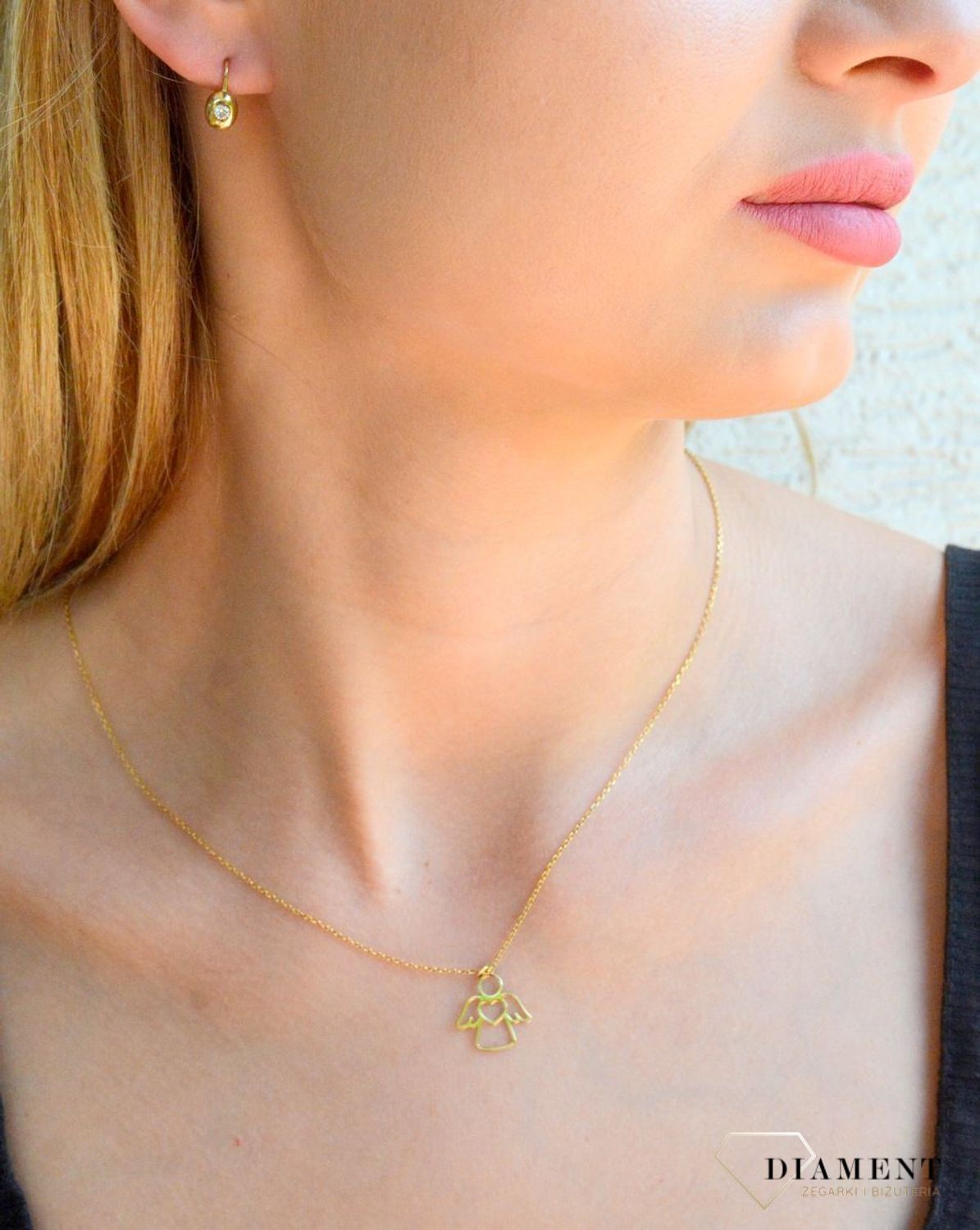 Złote kolczyki 333 z pojedynczą cyrkonią DIA-KLC-1578-333.jpg