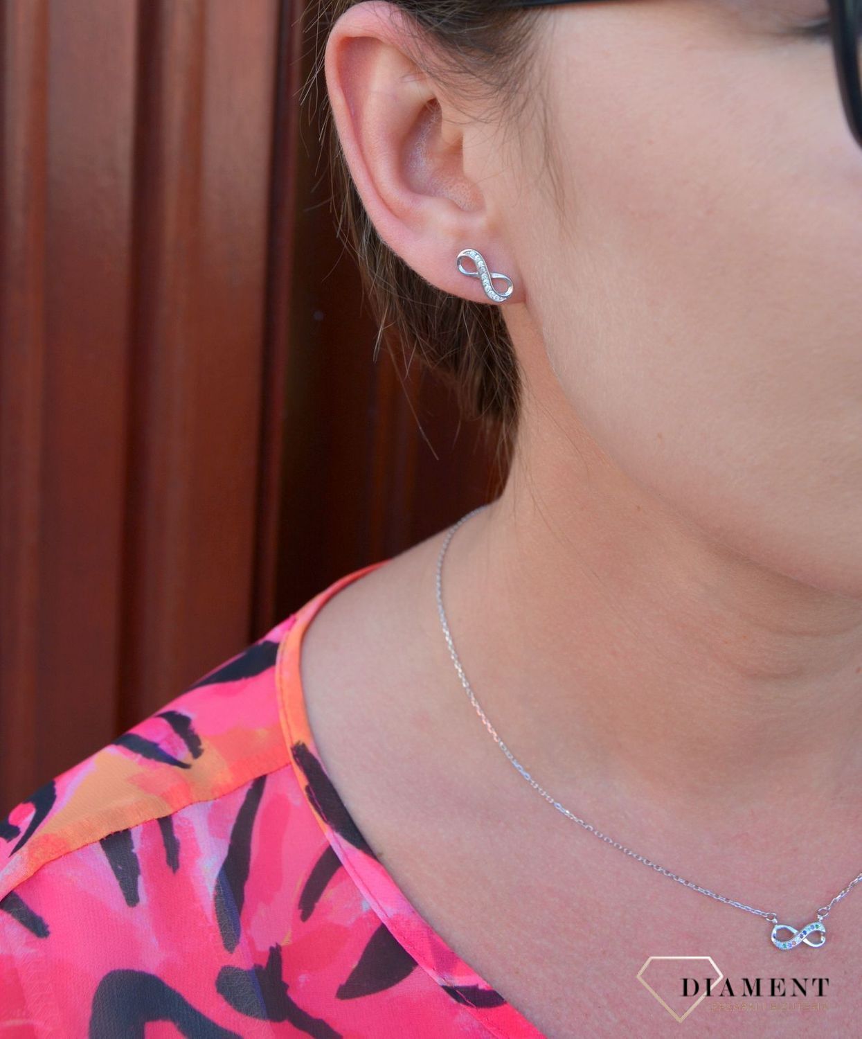 Srebrne kolczyki znak nieskończoności z cyrkonią DIA-KLC-2451-925.jpg