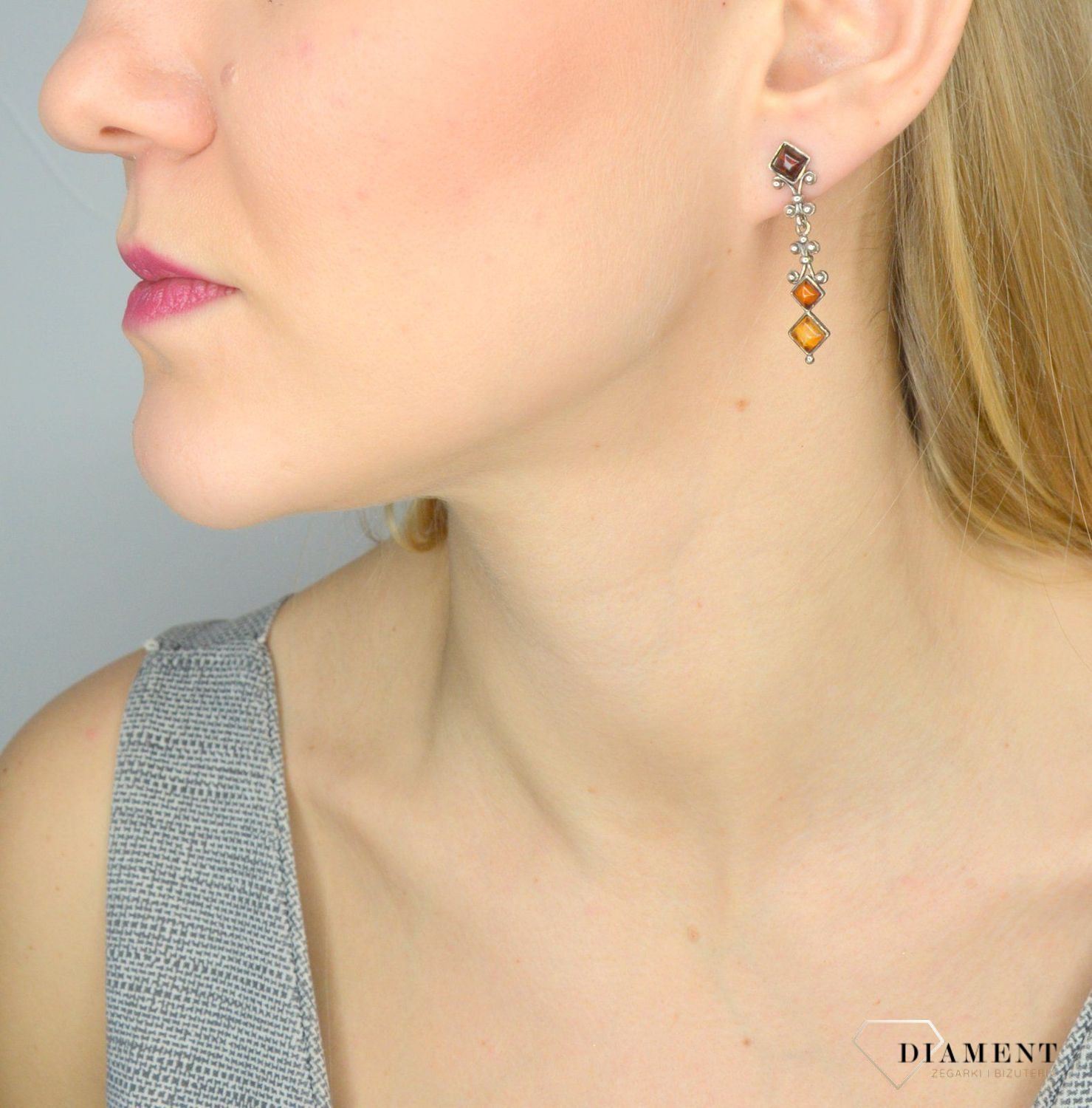 Srebrne kolczyki bursztyn z ozdobnym wzorem DIA-KLC-2565-925.jpg