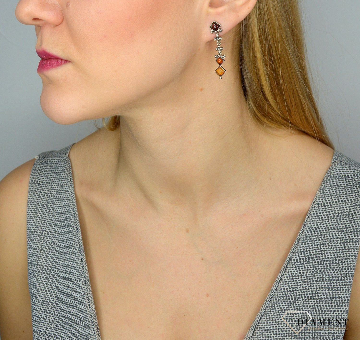 Srebrne kolczyki bursztyn z ozdobnym wzorem DIA-KLC-2565-925.jpg