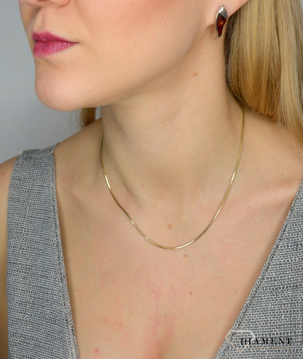 Srebrne kolczyki sztyfty wiszące z bursztynem DIA-KLC-2573-925.jpg