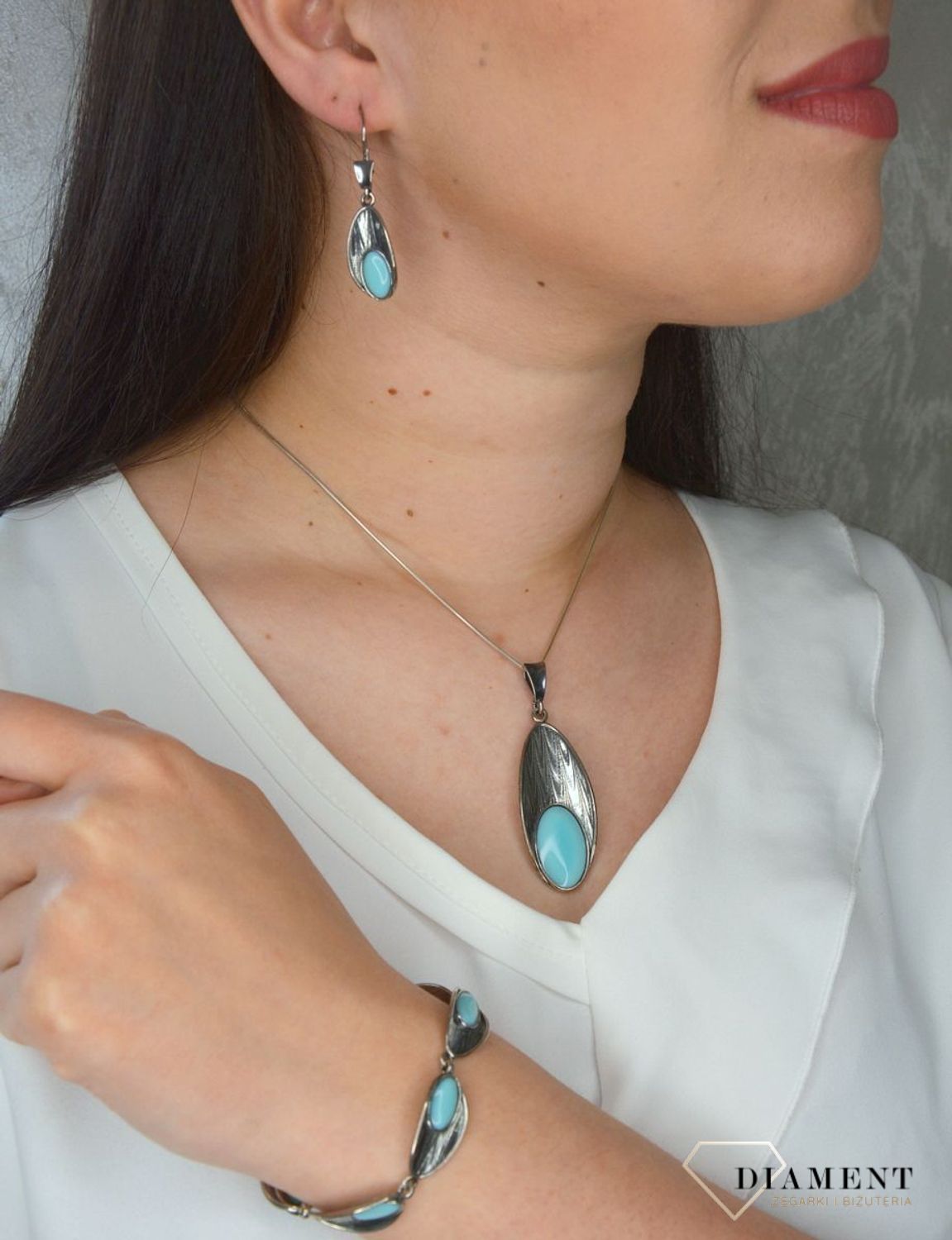 Srebrne kolczyki wiszące z turkusem syntetycznym DIA-KLC-2926-925.jpg