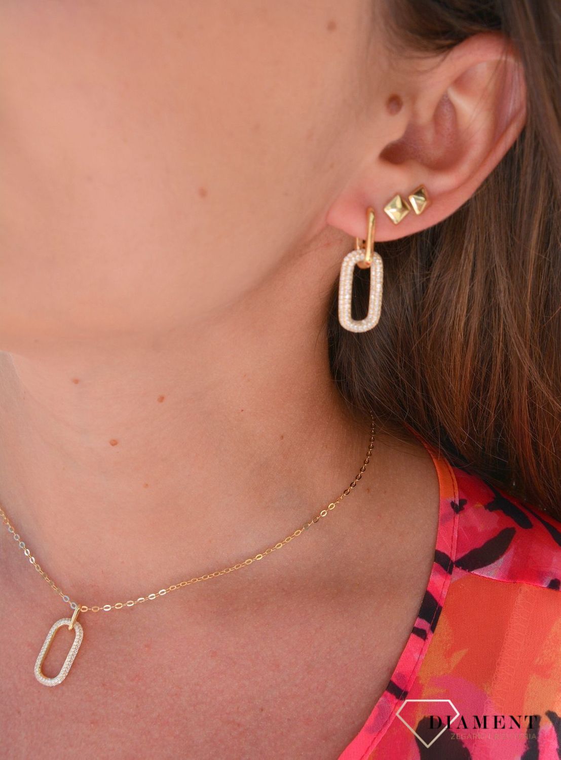 Srebrne kolczyki wiszące pozłacane owale z cyrkonią DIA-KLC-3015-925.jpg