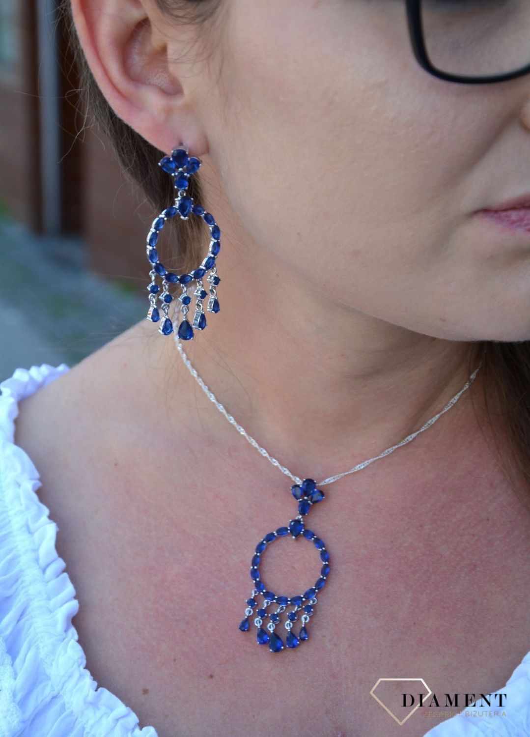 Srebrne kolczyki koła z wiszącymi elementami niebieskie cyrkonie DIA-KLC-3097-925.jpg