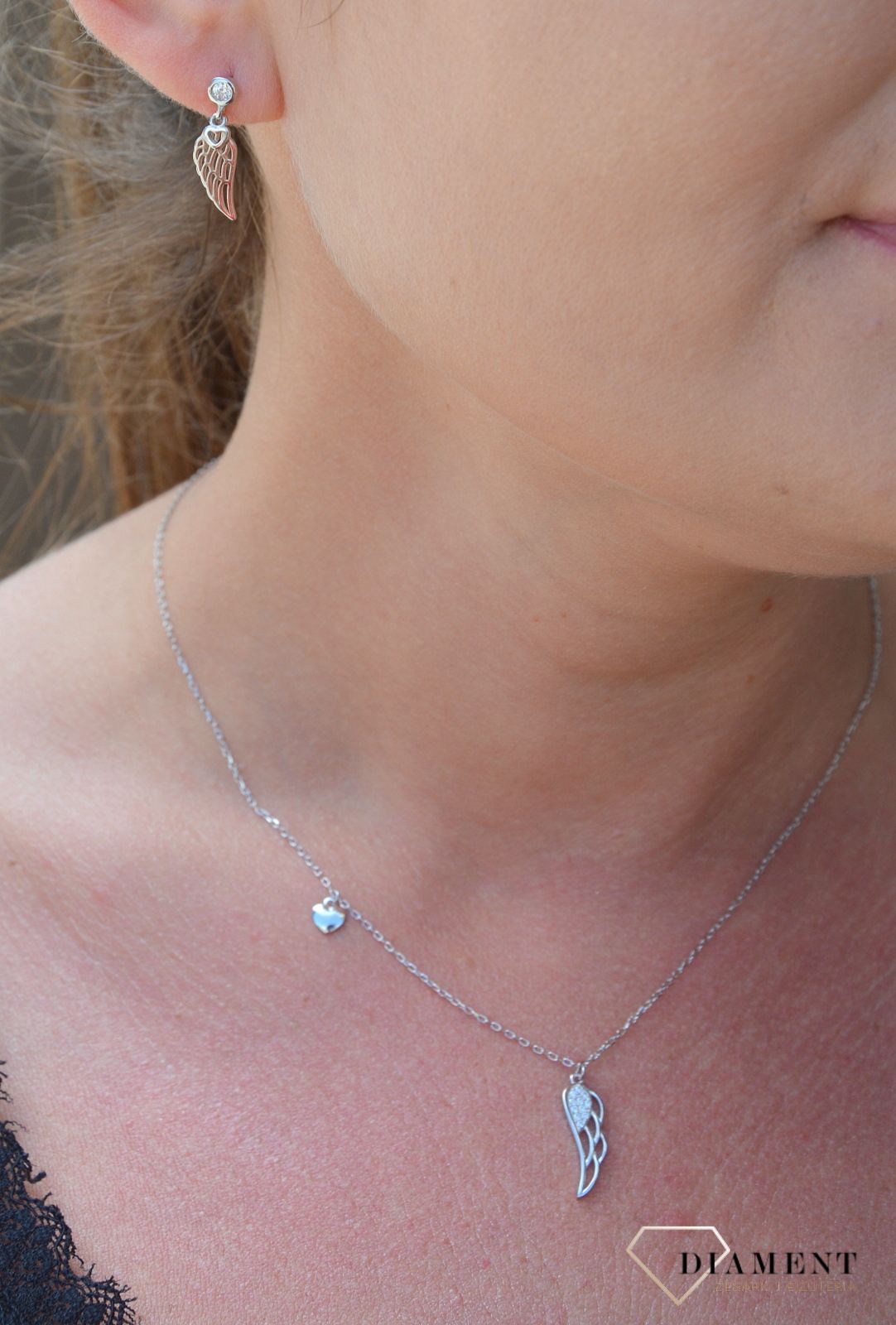 Srebrne kolczyki wiszące skrzydła z cyrkonią DIA-KLC-3541-925.jpg