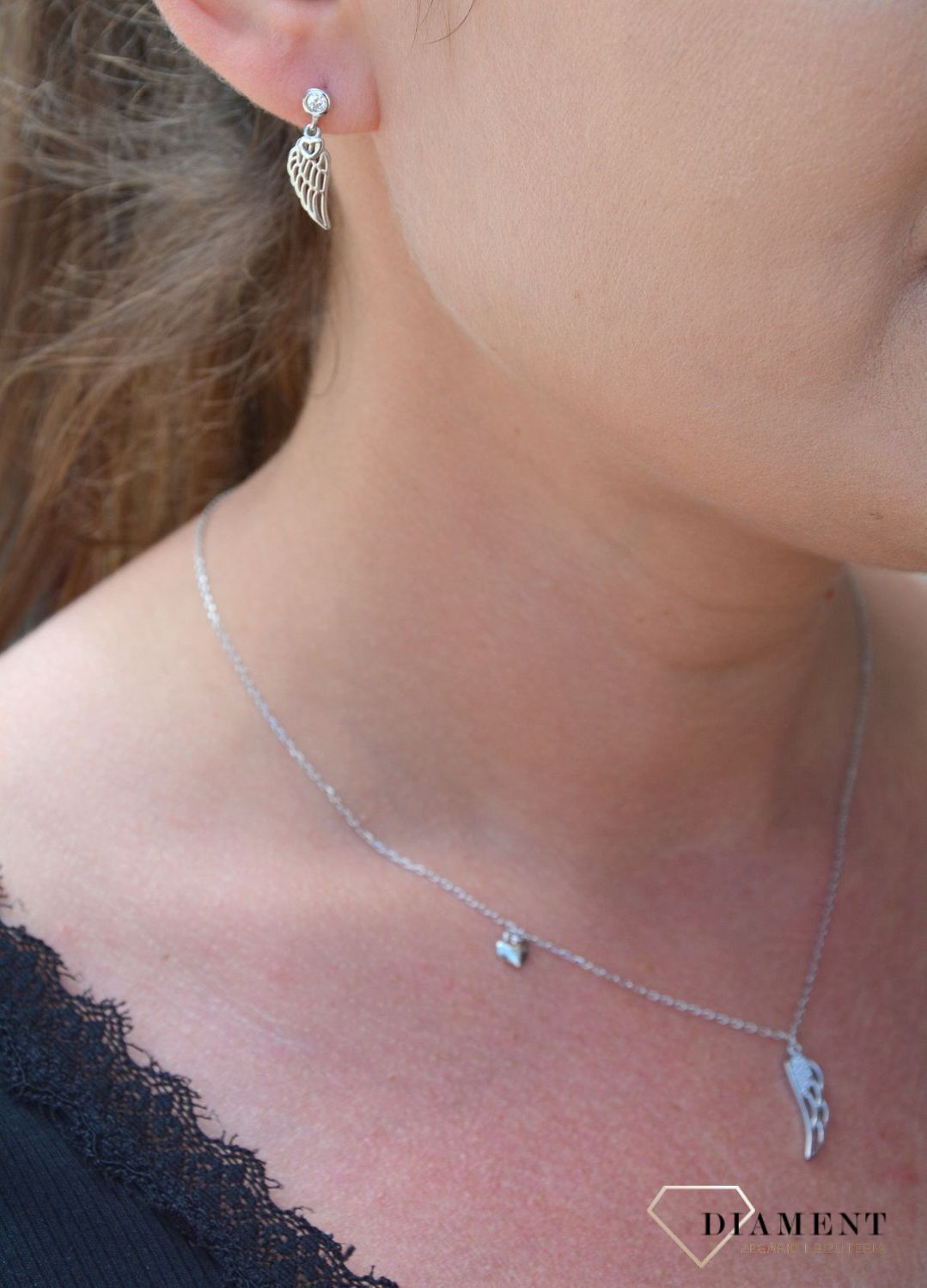 Srebrne kolczyki wiszące skrzydła z cyrkonią DIA-KLC-3541-925.jpg