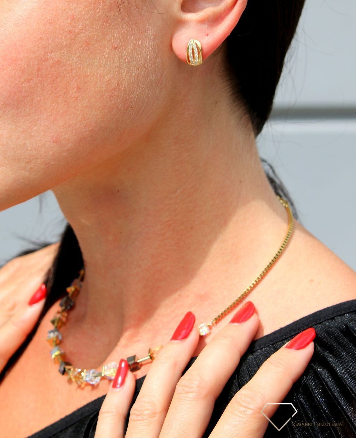 Złote kolczyki 333 ozdobione błyszczącą cyrkonią DIA-KLC-3641-333.jpg