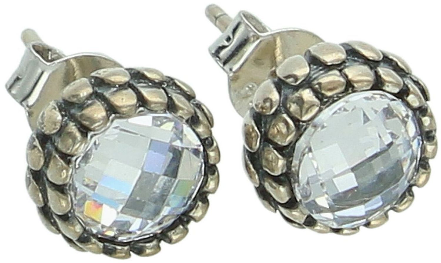 Eleganckie srebrne kolczyki na wkrętkę z cyrkonią w kształcie kwiatu. Wykonane ze srebra próby 925, idealne na prezent i do codziennych stylizacji.1.jpg