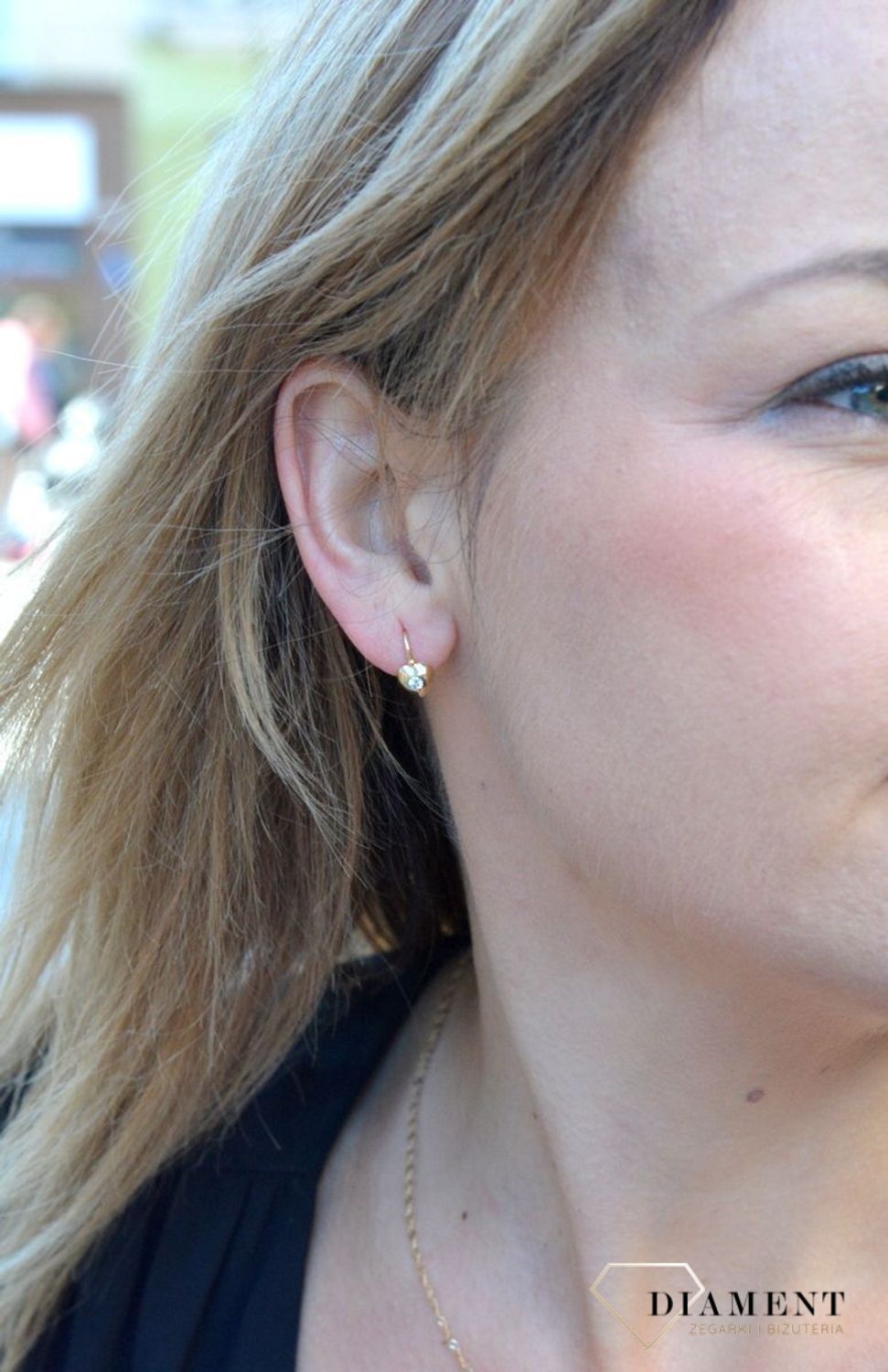 Złote kolczyki dla dziewczynki serca z białą cyrkonią DIA-KLC-4413-585.jpg