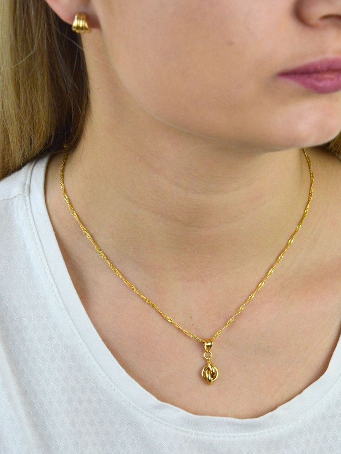 Złote kolczyki w kształcie muszelki DIA-KLC-5293-585.jpg