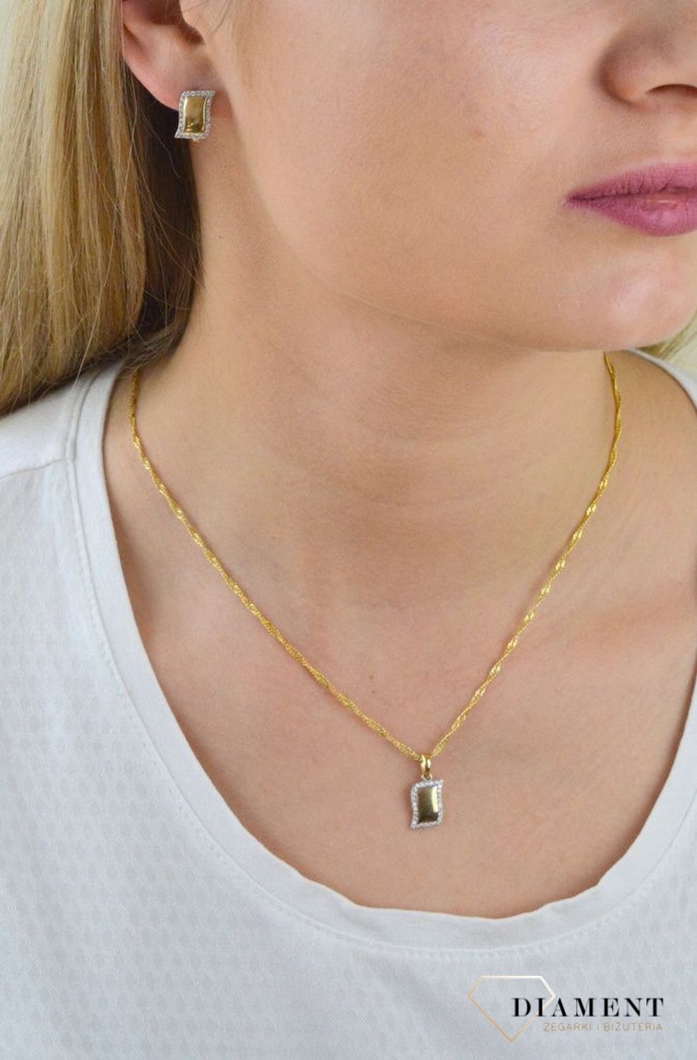 Złote kolczyki faliste z błyszczącą cyrkonią DIA-KLC-5311-585.jpg