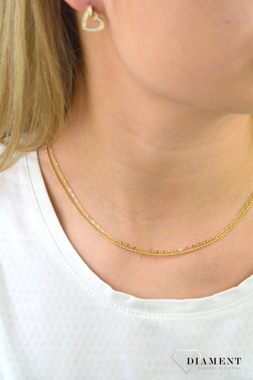 Kolczyki pozłacane  Serca w cyrkoniach  925 DIA-KLC-5955-925  Intrygująca biżuteria o klasycznym zapięciu na sztyft wykonana z srebra próby 925. Kolczyki idealne na prezent dla każdej.jpg