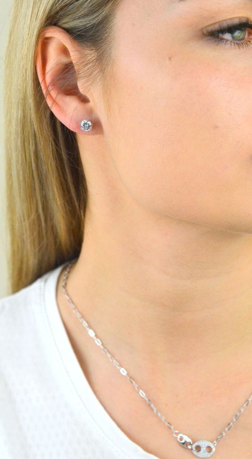 Kolczyki pozłacane z cyrkonią 0,6 mm 925 DIAMENT DIA-KLC-5960-925 Srebrne kolczyki z okrągłą cyrkonią w kolorze białym. Minimalistyczna biżuteria zapinana na sztyft, doda subtelnego blasku stworzonej styliz.jpg