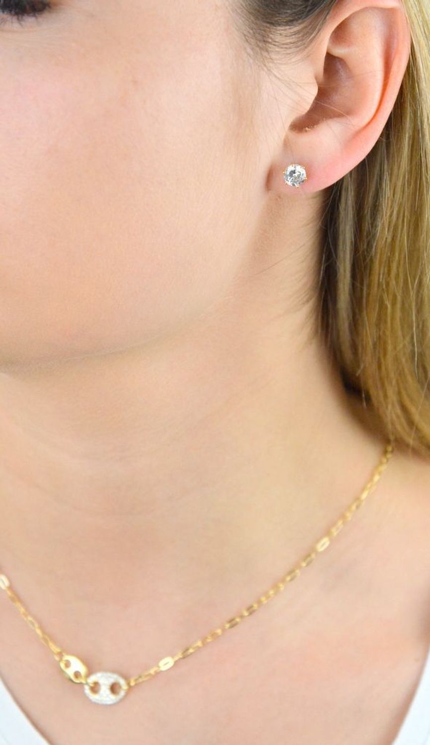 Kolczyki pozłacane z cyrkonią 0,6 mm 925 DIAMENT DIA-KLC-5960-925 Srebrne kolczyki z okrągłą cyrkonią w kolorze białym. Minimalistyczna biżuteria zapinana na sztyft, doda subtelnego blasku stworzonej styliz.jpg