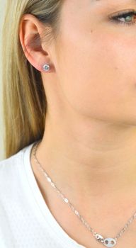 Kolczyki pozłacane z cyrkonią 0,6 mm 925 DIAMENT DIA-KLC-5960-925 Srebrne kolczyki z okrągłą cyrkonią w kolorze białym. Minimalistyczna biżuteria zapinana na sztyft, doda subtelnego blasku (5).JPG