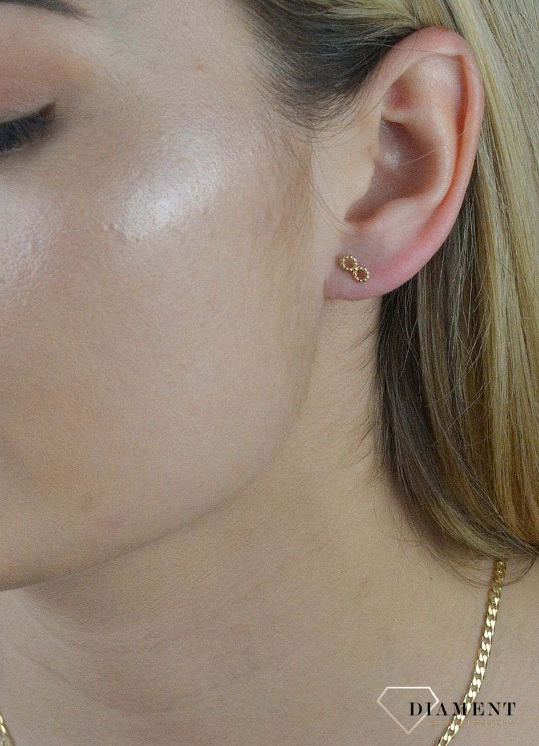 Złote kolczyki 585 znak nieskończoności DIA-KLC-6185-585.  💎 Złote kolczyki z motywem znaku nieskończoności 💎 Świetny dodatek do młodych dziewczyn 💎 Kolczyki wykonane z najwyższej jakości złota próby 58.jpg