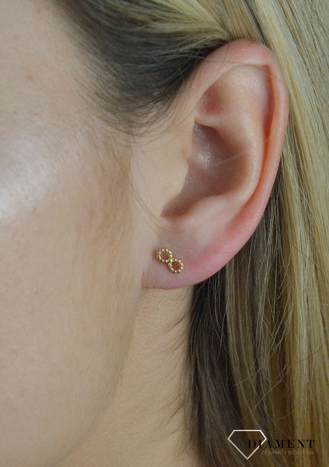 Złote kolczyki 585 znak nieskończoności DIA-KLC-6185-585.  💎 Złote kolczyki z motywem znaku nieskończoności 💎 Świetny dodatek do młodych dziewczyn 💎 Kolczyki wykonane z najwyższej jakości złota próby 58.jpg