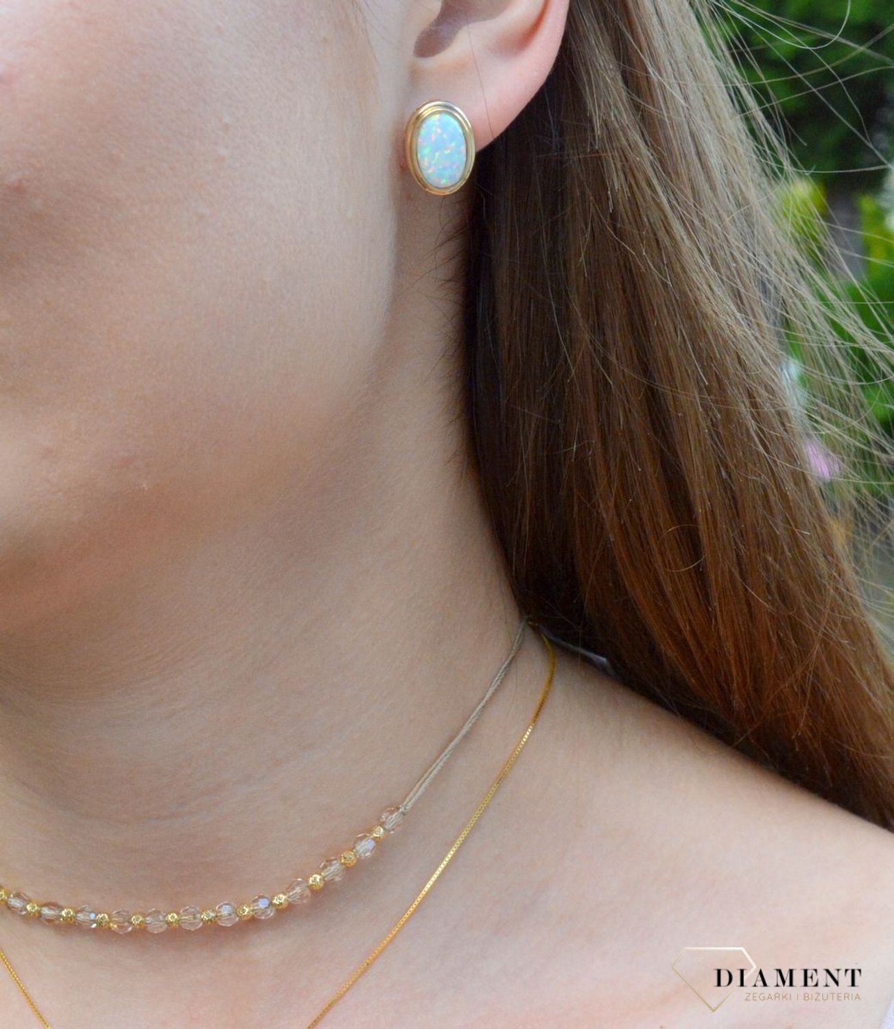 Złote kolczyki owalne z opalem DIA-KLC-6239-585. Złote kolczyki z opalem. Złote kolczyki z zapięciem lira. Złote kolczyki damskie. Złote kolczyki z kamieniem. Złote k.jpg