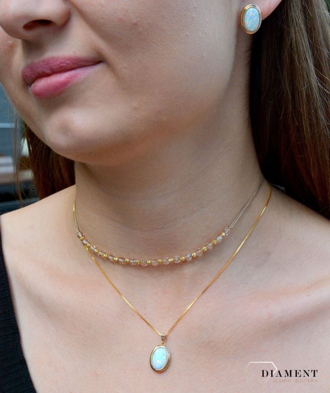 Złote kolczyki owalne z opalem DIA-KLC-6239-585. Złote kolczyki z opalem. Złote kolczyki z zapięciem lira. Złote kolczyki damskie. Złote kolczyki z kamieniem. Złote k.jpg