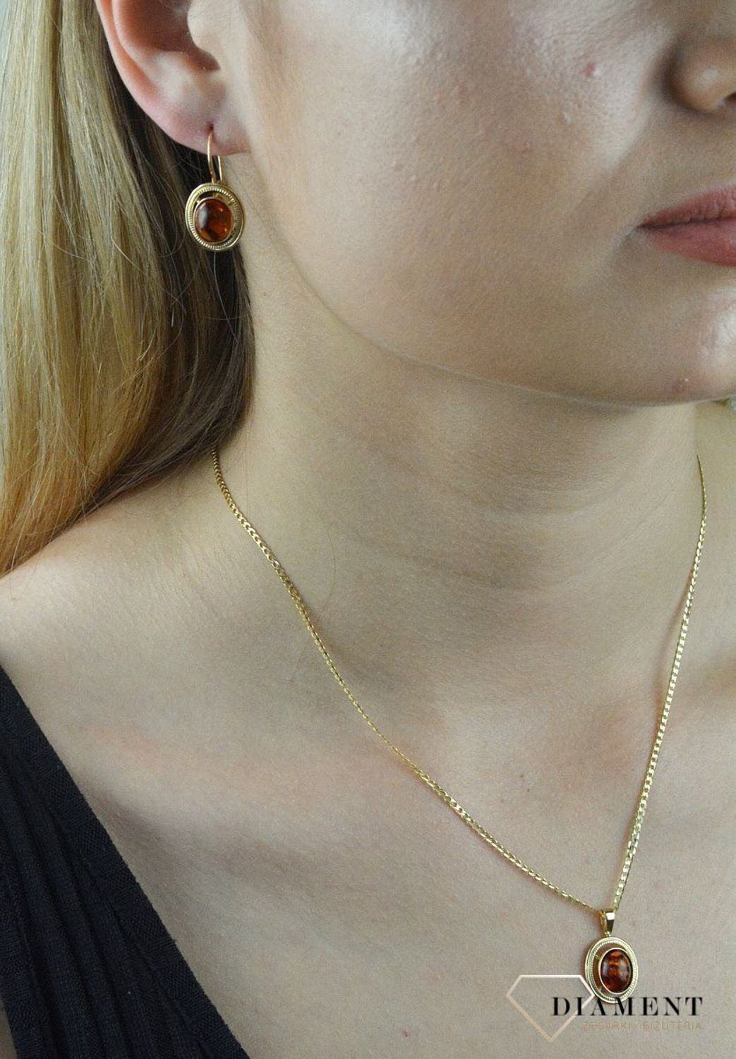 Złote kolczyki 585 z Bursztynem DIA-KLC-6492-585. Kolczyki złote z bursztynem. Kolczyki złote damskie. Kolczyki złote z bursztynem. Kolczyki złote.jpg