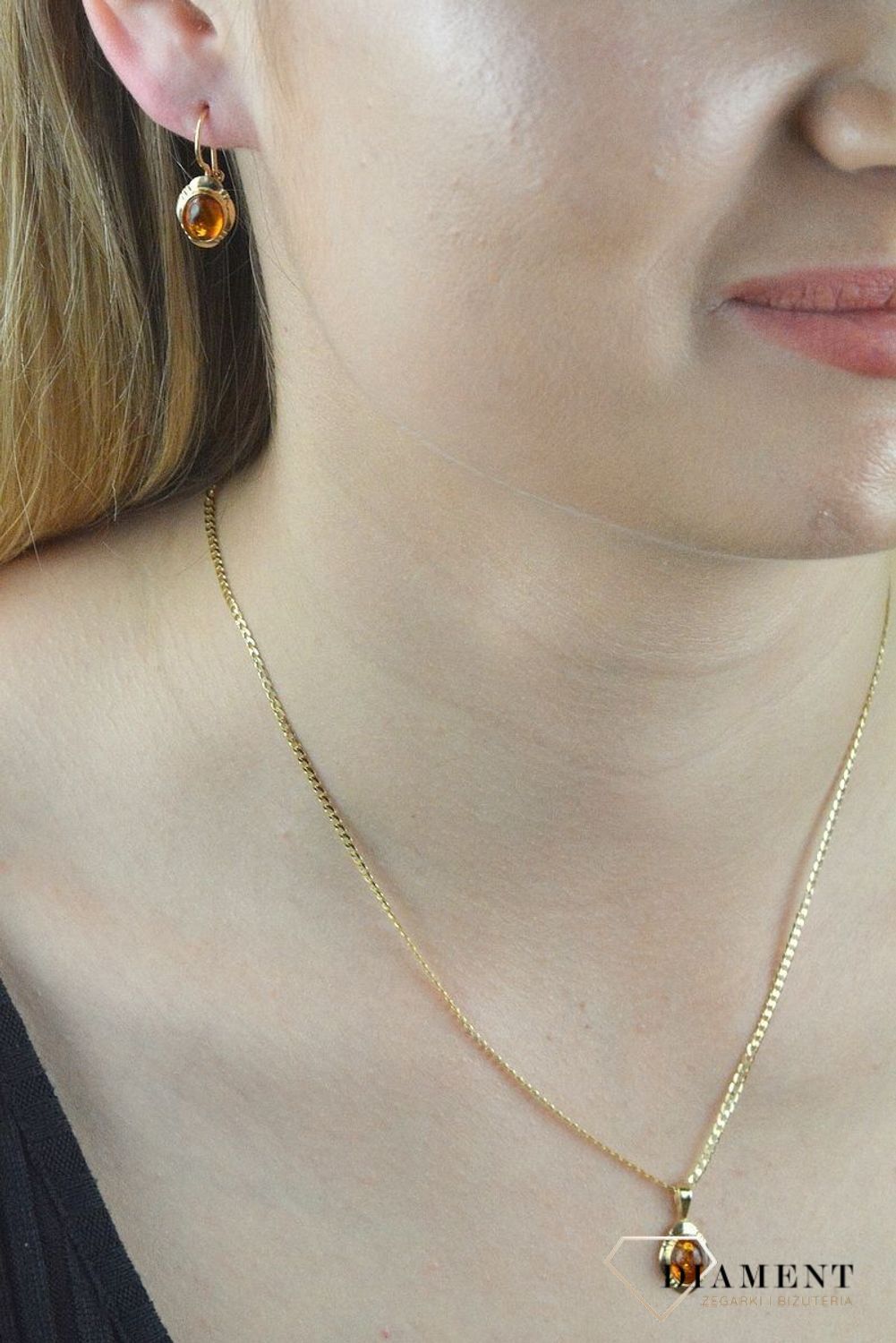 Złote kolczyki 585 z Bursztynem DIA-KLC-6493-585. Kolczyki złote z bursztynem. Kolczyki złote damskie. Kolczyki złote z bursztynem. Kolczyki złote z zapię.jpg