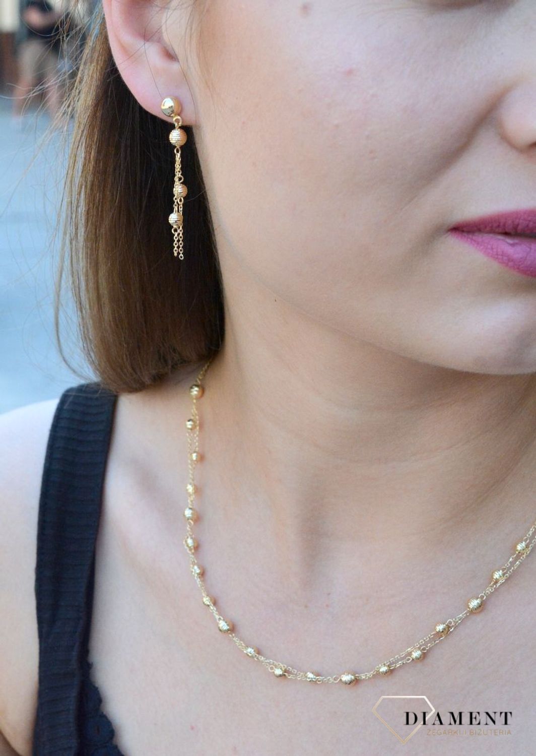 Złote kolczyki 585 z kulkami złota na łańcuszku DIA-KLC-6529-585. Złote kolczyki na łańcuszku. Złote kolczyki wiszące. Złote kolczyki z kulkami złota. Kolczyki złote idealna na prezent. Kolczyki eleganckie dla kobiety..jpg