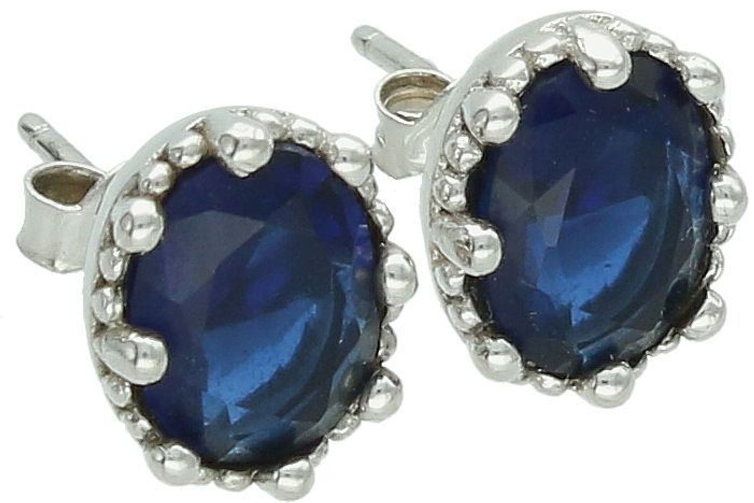 Eleganckie kolczyki damskie srebrne próba 925, owalne, zdobione granatową cyrkonią. Waga 3,40 g, wielkość 1,0 cm x 8 mm, zapięcie na sztyft. Model DIA-KLC-6737-925.1.jpg