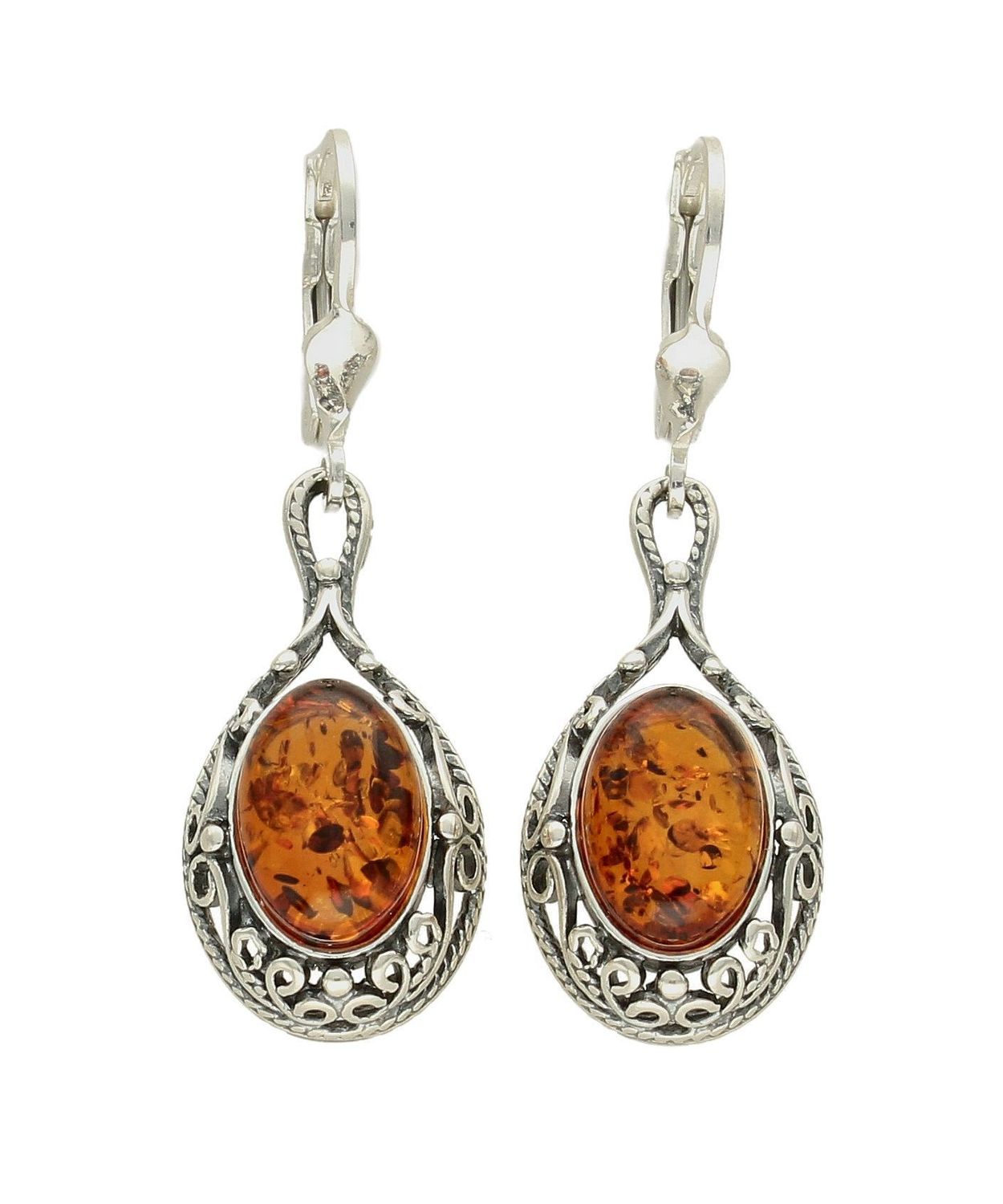 Kolczyki srebrne wiszące z owalnym bursztynem DIA-KLC-7101-925.  Srebrne kolczyki z bursztynem to modelem bardzo ciekawy, ponieważ dzięki ciepłej kolorystyce pięknie podkreśla on urodę. Charakteryzują się stylem wiszącym i są.jpg