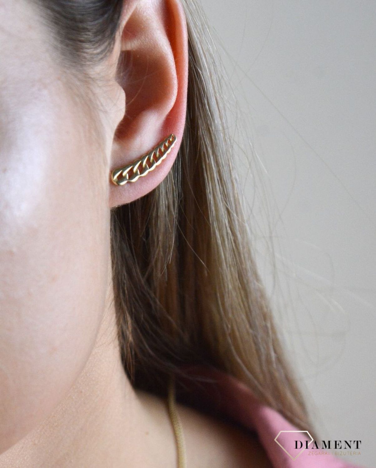 Złote kolczyki 585 nausznice DIA-KLC-7842-585. Nausznice będą idealną ozdobą zarówno do casualowych, jak i do wieczorowych kreacji, zwłaszcza w połączeniu ze zjawiskowym naszyjnikiem do kompletu. Złote kolczyki wykonane zosta.jpg