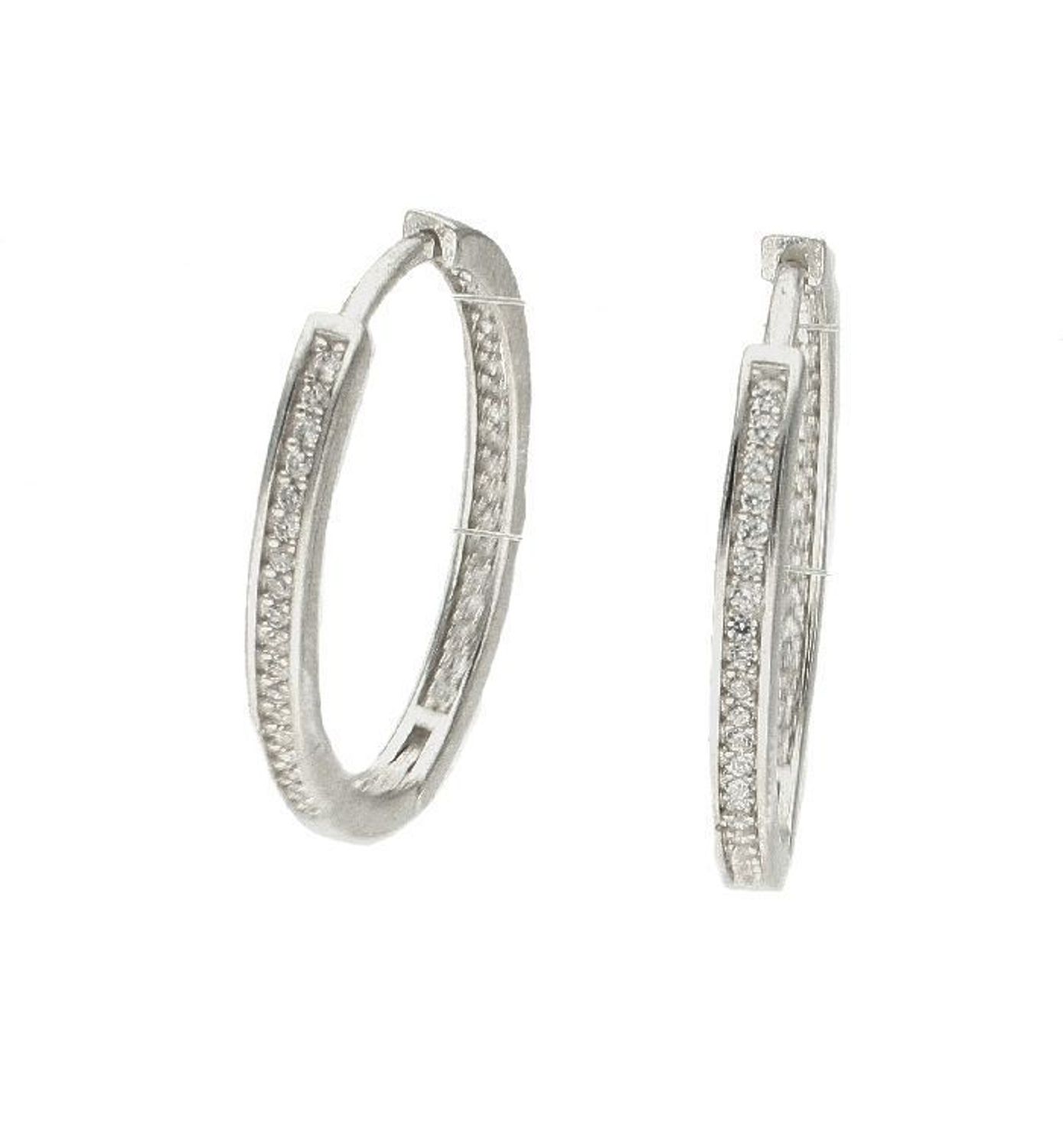 Srebrne kolczyki owalne z cyrkoniami DIA-KLC-8848-925. Srebrne kolczyki owalne z cyrkoniami. Kolczyki o owalnym kształcie świetnie się prezentują w blasku srebra. Do kolczyków warto dobrać także pasujący naszyjnik. Taki dodate.jpg