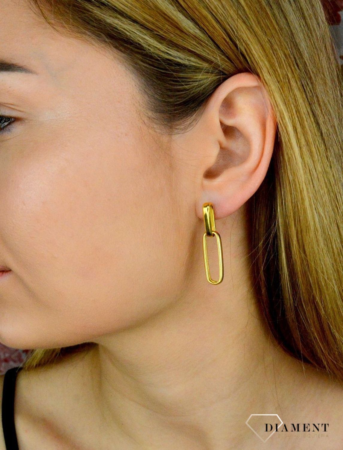 Srebrne kolczyki wiszące spinacze pokryte złotem DIA-KLC-9092-925. . Całość wykonana z najwyższej jakości srebra próby 925 w pozłoceniu. Biżuteria to świetny pomysł na prezent. Srebrne kolczyki o bardzo efektownym modelu..jpg