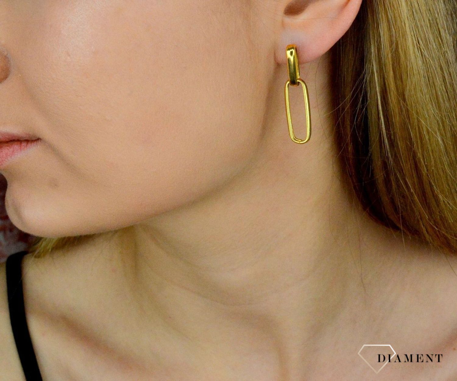 Srebrne kolczyki wiszące spinacze pokryte złotem DIA-KLC-9092-925. . Całość wykonana z najwyższej jakości srebra próby 925 w pozłoceniu. Biżuteria to świetny pomysł na prezent. Srebrne kolczyki o bardzo efektownym modelu..jpg