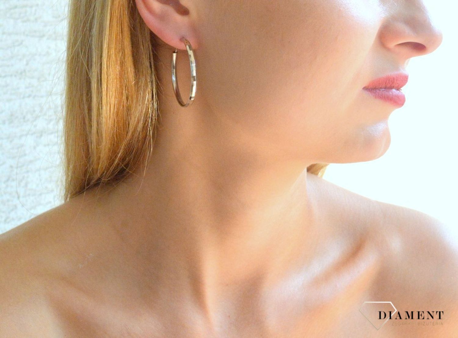 Srebrne kolczyki damskie koła 3,5 cm DIA-KLC-9988-925. Srebrne kolczyki damskie klasyczne kółka. Klasyczne kółka srebrne z delikatnym wzorem. Piękne kolczyki z wygodnym zapięciem z chowanym sztyftem. Kolczyki koła idealne na p.jpg