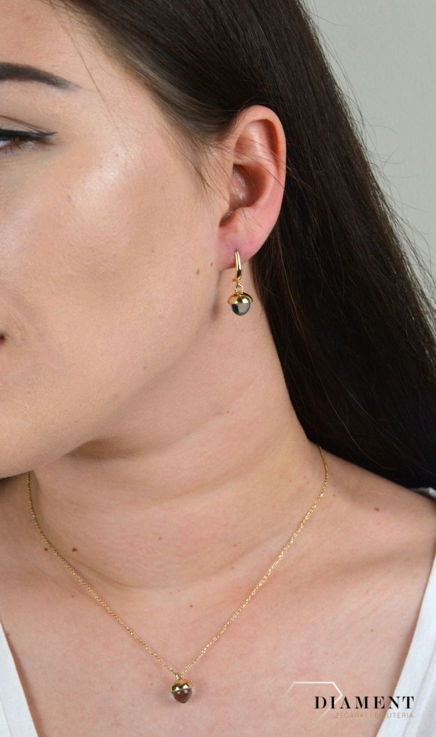 Złote kolczyki wiszące z topazem DIA-KLC-G020MOD-585.jpg