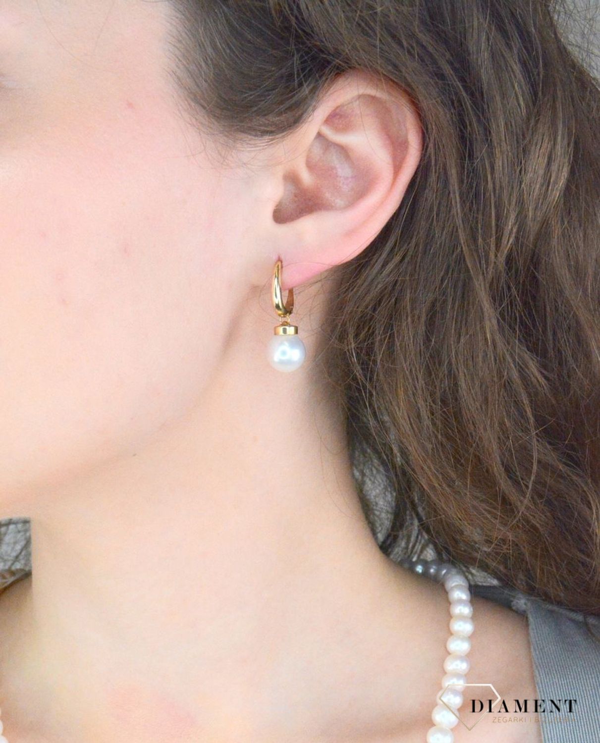 Kolczyki złote okrągłe perełki pr 585, DIA-KLC-GA.OR4013-585 Złote kolczyki damskie wykonane z wysokiej jakości złota próby 585 okrągłe perełki. Kolczyki to idealna proporcje zamknięte w pięknej kompozycji.1.jpg